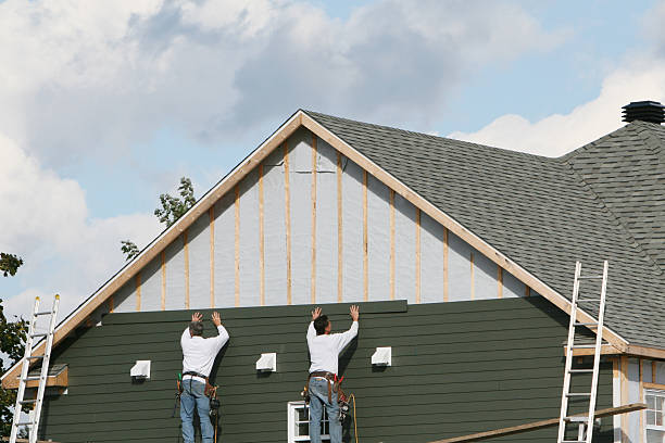 Professional Siding Contractor technician working in Westville, IL